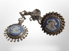 A silver ring and further pendant