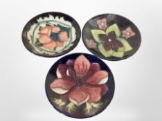 Three Moorcroft pin dishes,