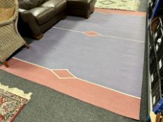 A 20th century machine made carpet 294 cm x 204 cm