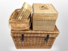 A group of wicker hampers and baskets