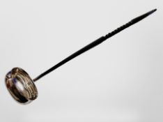 A silver toddy ladle,