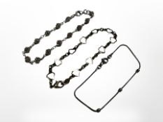 Two silver fancy link bracelets and a further white metal example