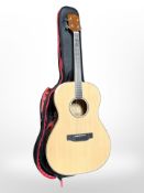 An Ashbury four string tenor guitar with soft carry bag