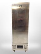 A Foster stainless steel commercial fridge on castors