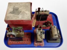 Four Mamod live steam engines on plinths