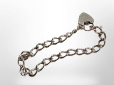 A silver bracelet with padlock