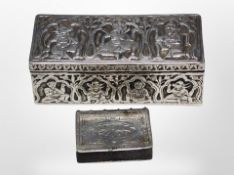 An Indian silver box and a silver mounted vesta in the form of a book