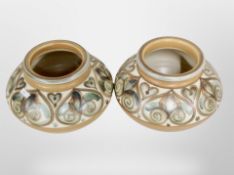 A pair of Langley ware glazed vases,