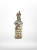 A silver ship in bottle