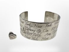 A Tiffany style bangle and earring.