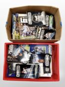 Two boxes of Leeds United football programmes.