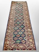 A Caucasian Shirvan runner on indigo ground,