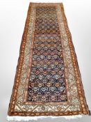 A Northwest Iranian runner, 296cm x 100cm.