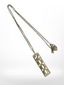 A '2000' gold plated on silver pendant on chain