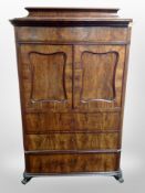 A 19th century Danish mahogany double door cocktail cabinet,