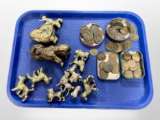 A group of cast metal dog ornaments, Victorian coins.