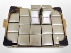 A quantity of earring boxes.