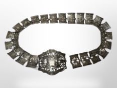 A silver-plated nurse's belt.