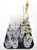 A gilt blue glass eyer with five matching goblets, together with asorted crystal drinking glasses.