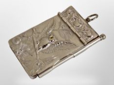 A small EPNS-mounted notebook depicting an owl.