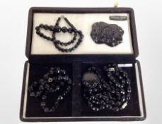 A group of jet jewellery.