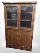 A 19th century Danish flame mahogany glazed bookcase,