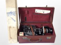 A Bolex H16 16mm reflex cine camera in leather carry case with assorted accessories,