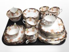 Approximately thirty four pieces of Wellington Imari tea china.