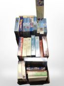 Two boxes containing jigsaws and puzzles.