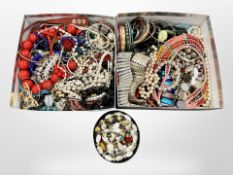 Three boxes of assorted costume jewellery, bangles, bead necklaces, etc.