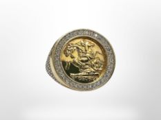 A silver gilt ring set with CZ