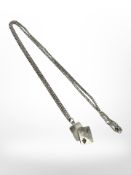 A playing card pendant on silver chain