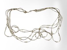 A German gold plated triple strand necklace