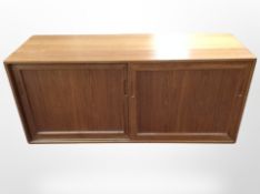 A teak sliding door cabinet,