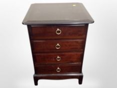 Three Stag Minstrel four drawer bedside chests,