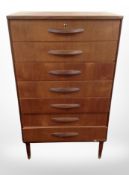 A 1970's Danish teak seven drawer chest,
