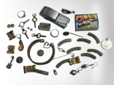 A group of collectables, pocket watch keys, Merit 00 gauge station figures, bangle,