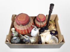 A box containing two wicker-bound storage boxes, a lamp base, Lladro figure of a boy reclining,