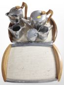 Seven pieces of Picquot ware stainless steel tea wares