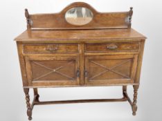 An Edwardian oak mirror backed sideboard,