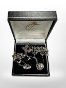 A pendant on chain together with 'skeleton' earrings etc