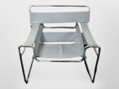 A pair of late 20th century Scandinavian chrome framed armchairs with grey leather sling seats