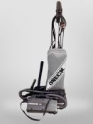 Two Oreck vacuum cleaners
