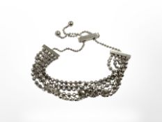 A five row silver bracelet