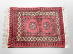 A Bokhara rug, 78cm x 52cm.