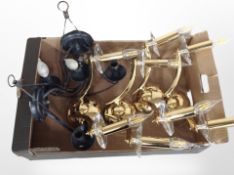 A box of contemporary wall lights.