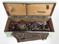 Four painted joiners tool boxes containing assorted hand tools, carpentry tools, files,