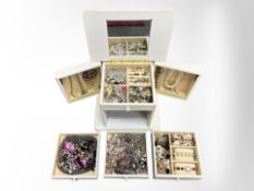 A contemporary jewellery box and contents to include lady's wristwatch, costume jewellery,