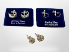 Three pairs of silver earrings