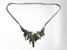 A heavy silver necklace